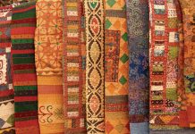 tapestries arranged in a line
