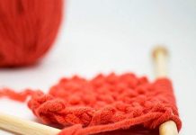 bamboo knitting needles with red wool