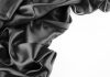 Black silk on a white background