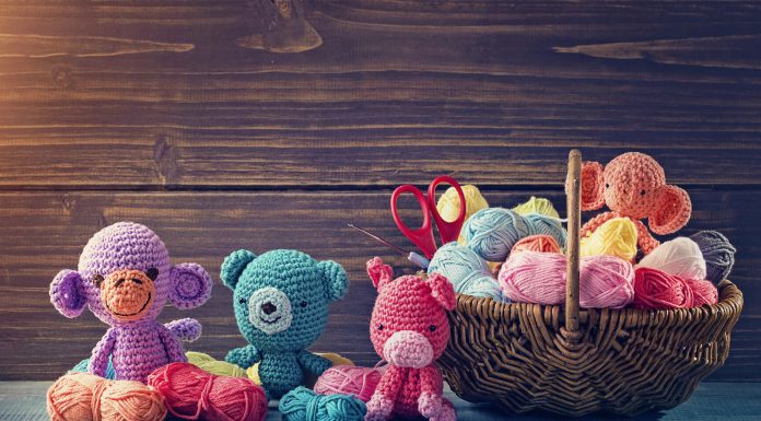 Amigurumi toy animals next to a basket